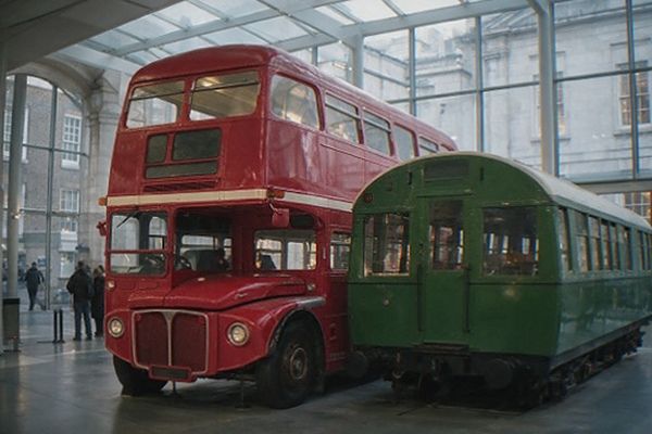 A row of restored vintage London buses inside the museum's main hall